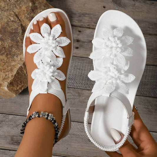 Fiorella | Sandalia elegante con flores y perlas
