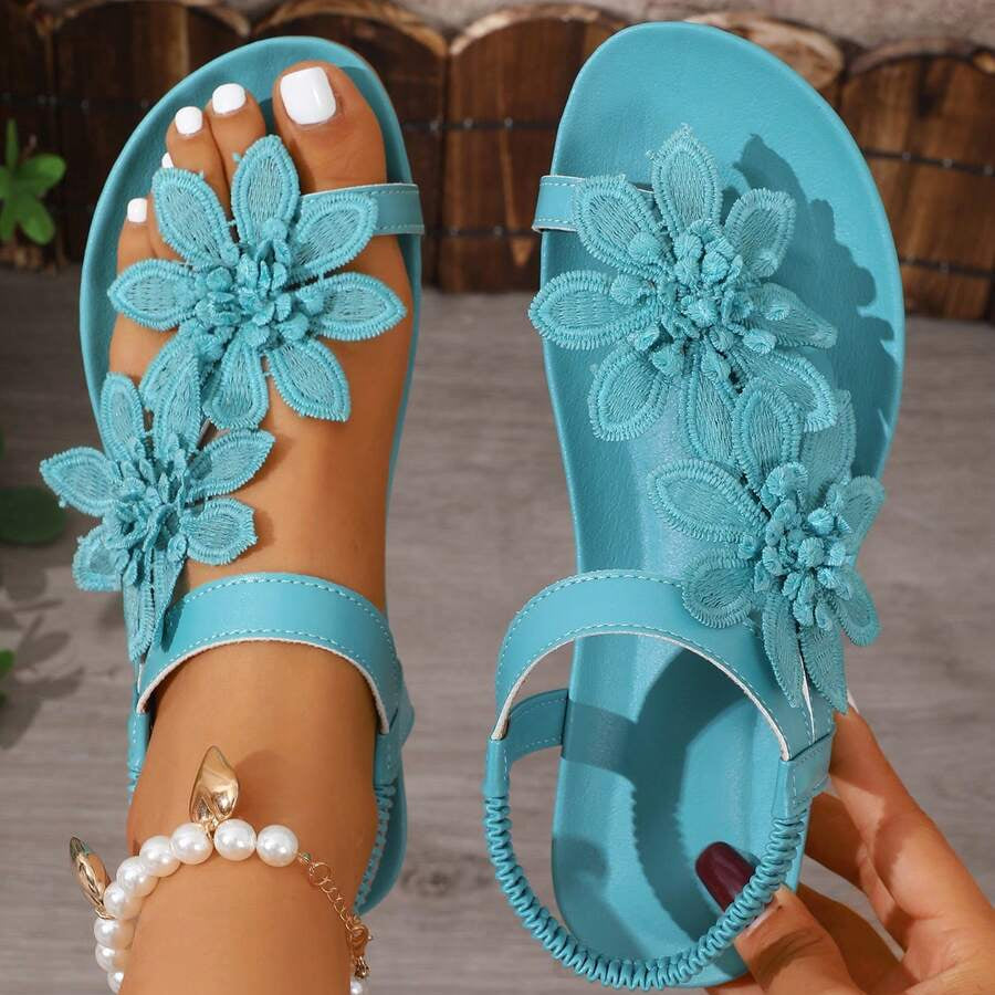 Fiorella | Sandalia elegante con flores y perlas